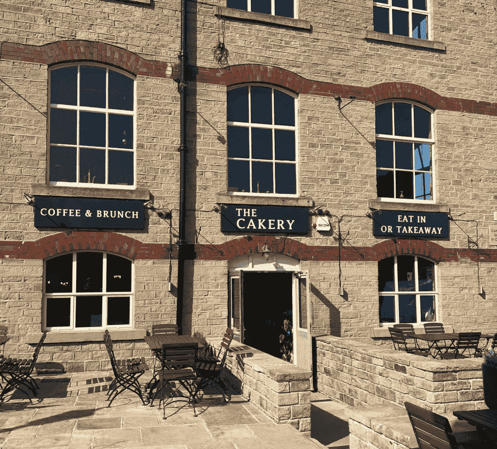 Front view of the entrance to The Cakery. A dog friendly cafe in West Vale, Halifax.