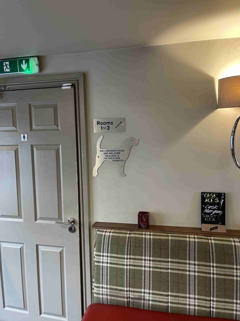 Dog friendly sign on wall of Masons Freehouse in Ingleton