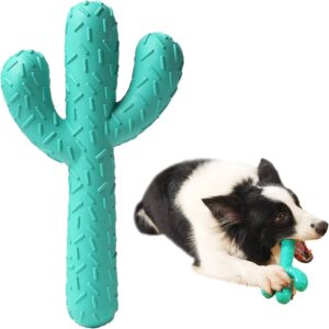 Green rubber Acey dog toy in the shape of a cactus and a dog chewing it on the right hand side